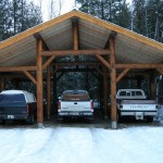Log post and beam carport by Log and Timber Works Saskatchewan