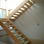 Timber frame stairs and landing in a home by Log and Timber Works Saskatchewan