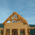 Exterior timber frame truss on a timber frame home by Log and Timber Works Saskatchewan