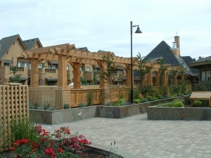 Timber frame trellis and railings for covered walkway by Log and Timber Works Saskatchewan