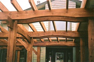 Timber frame entry trellis by Log and Timber Works British Columbia