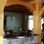 Completed breakfast bar in a timber frame home by Log and Timber Works Saskatchewan