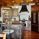 Completed kitchen of a custom designed timber frame home by Log and Timber Works Saskatchewan