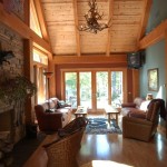 Finished living room in a timber frame home by Log and Timber Works Saskatchewan