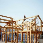 Lakefront timber frame home under construction by Log and Timber Works Saskatchewan