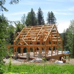 Traditional timber frame home under construction by Log and Timber Works Saskatchewan