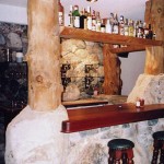 Log bar in a home by Log and Timber Works British Columbia