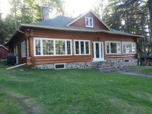 Refinished and chinked log home by Log & Timber Works British Columbia